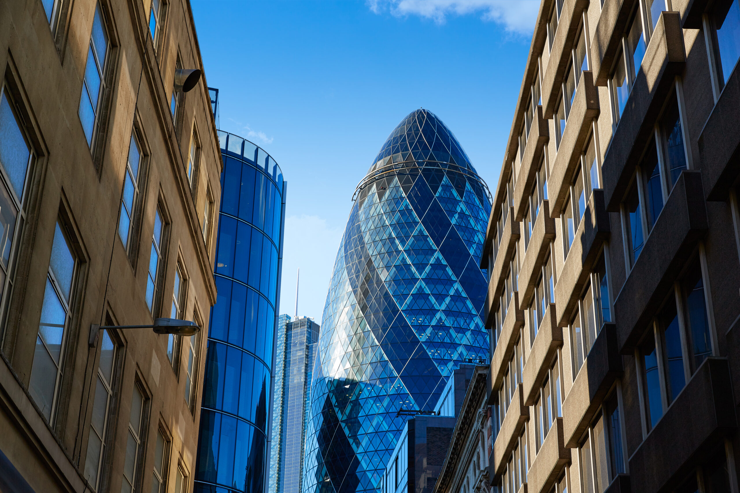 London financial district street with The Gherkin in the background
