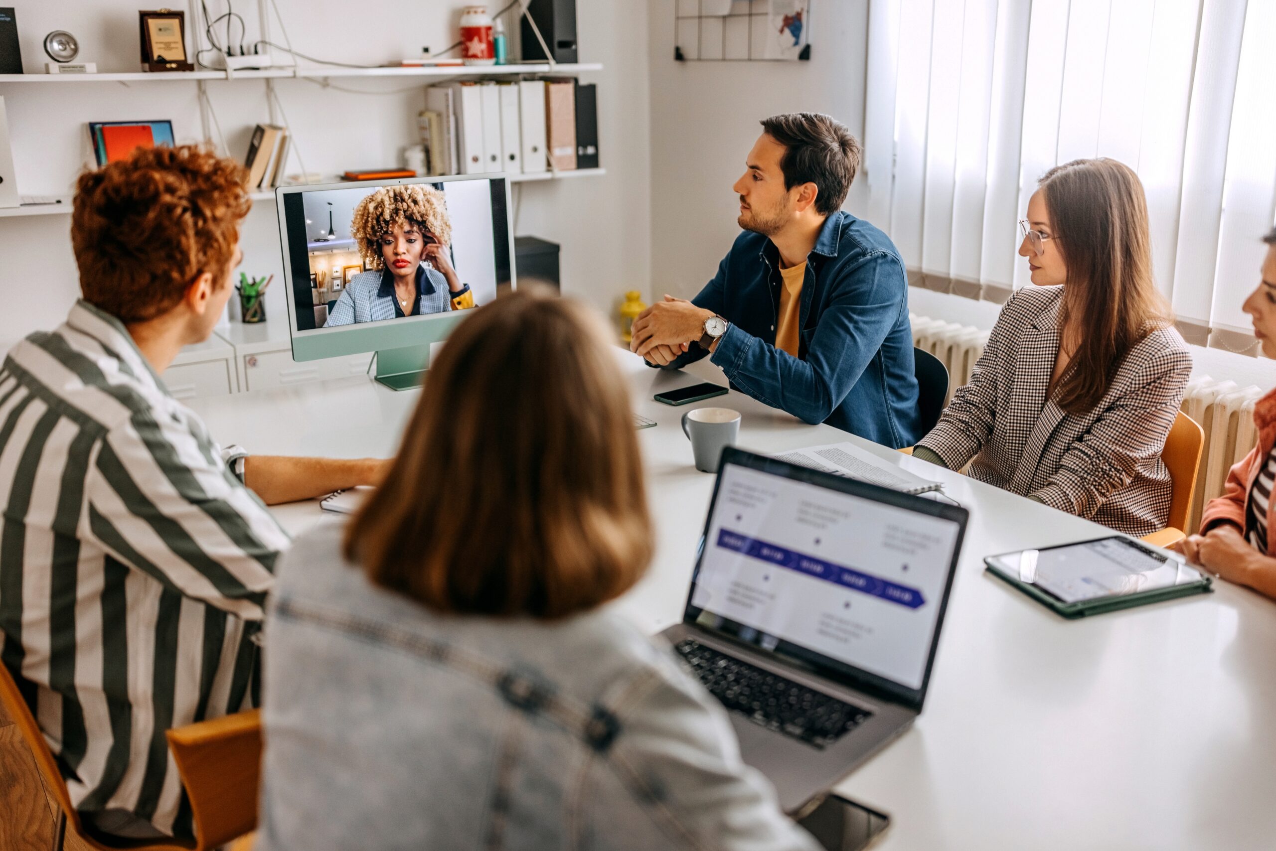 Hybrid working employees in a virtual meeting