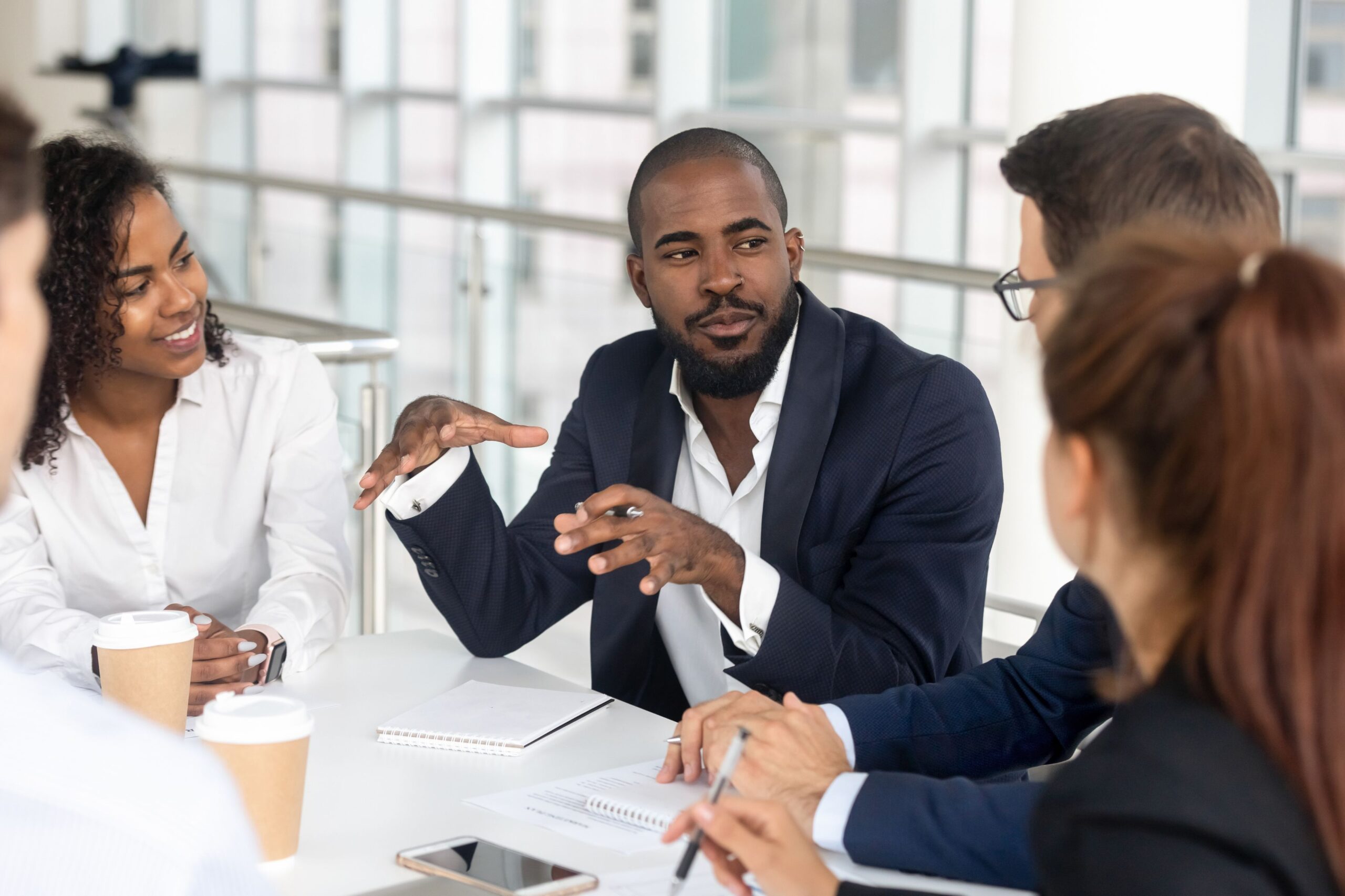 Boss having meeting with employees