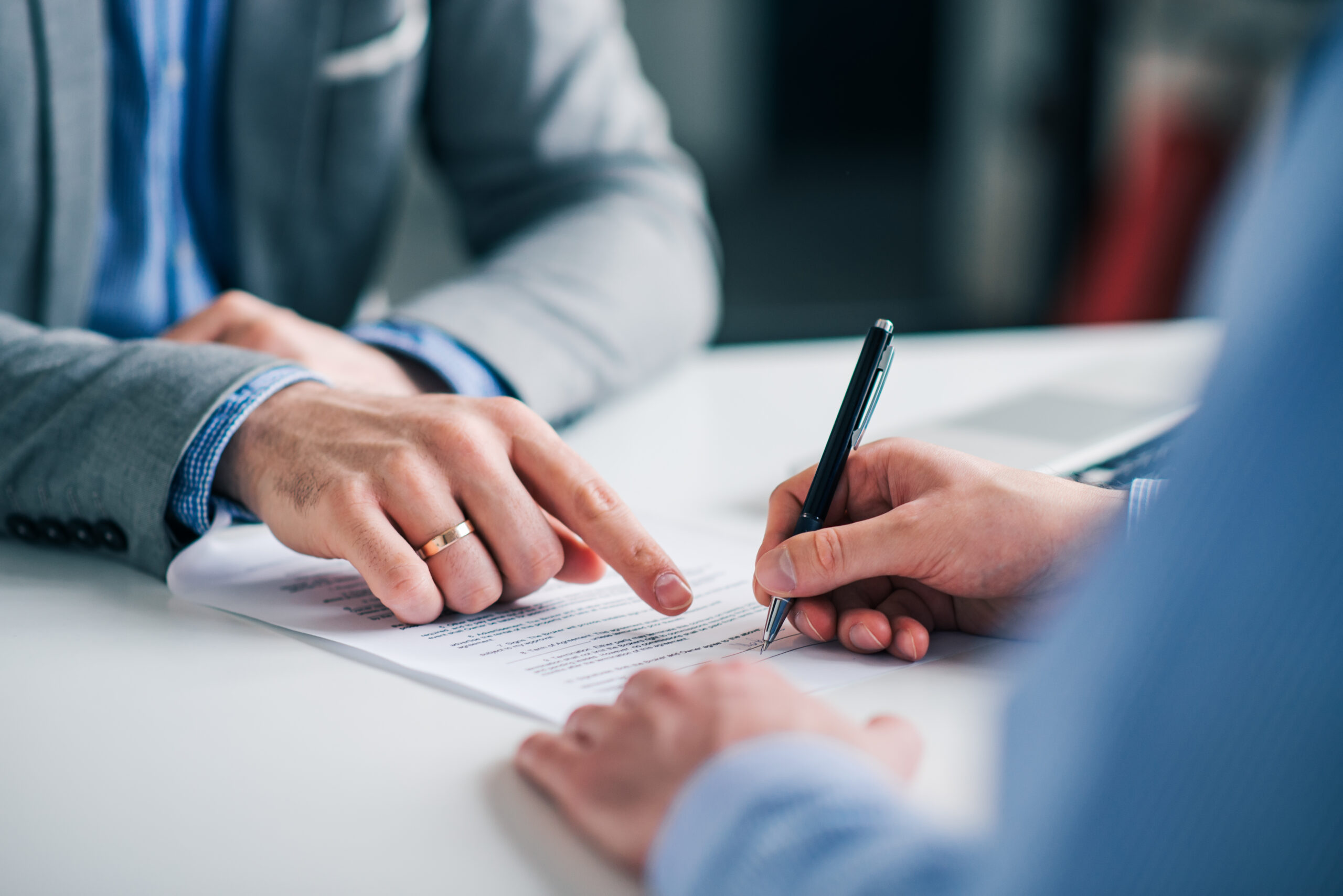 Two men agreeing office space contract