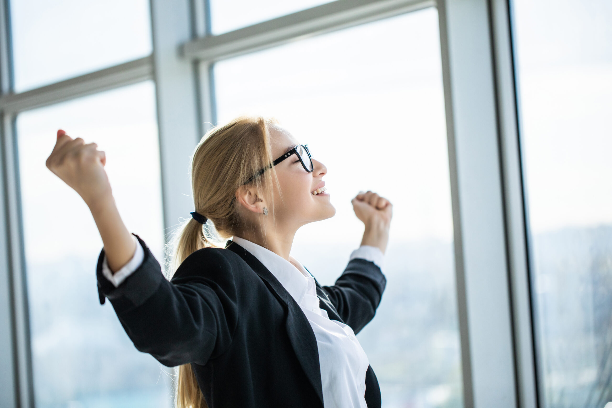 Motivated business woman happy with her progress