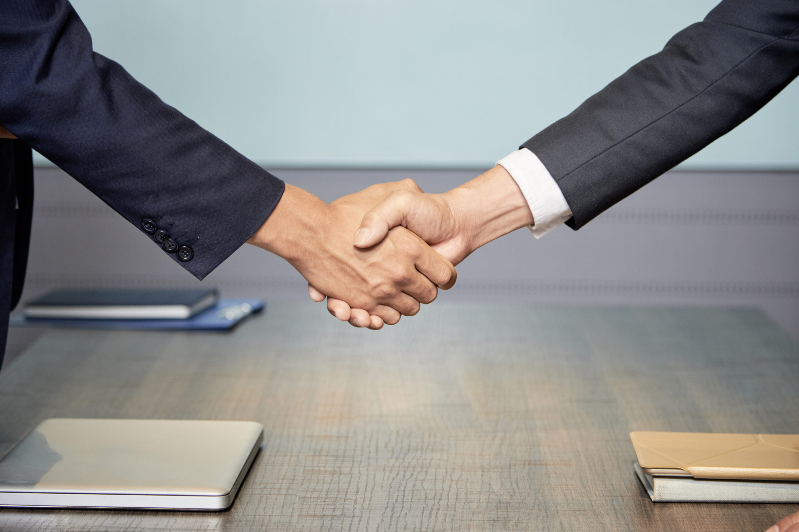 People shaking hands at conference