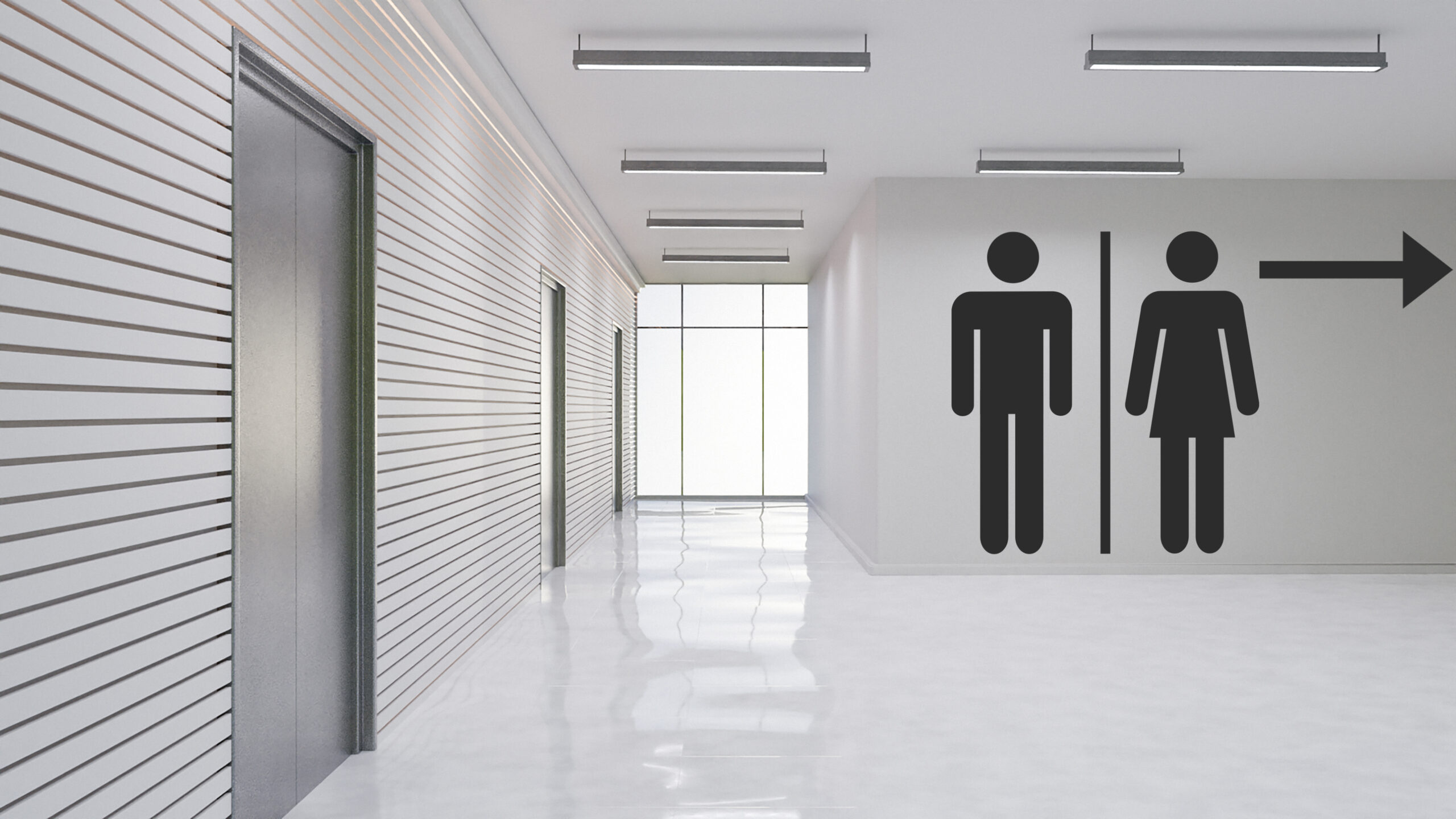 bathrooms in an office building with showers