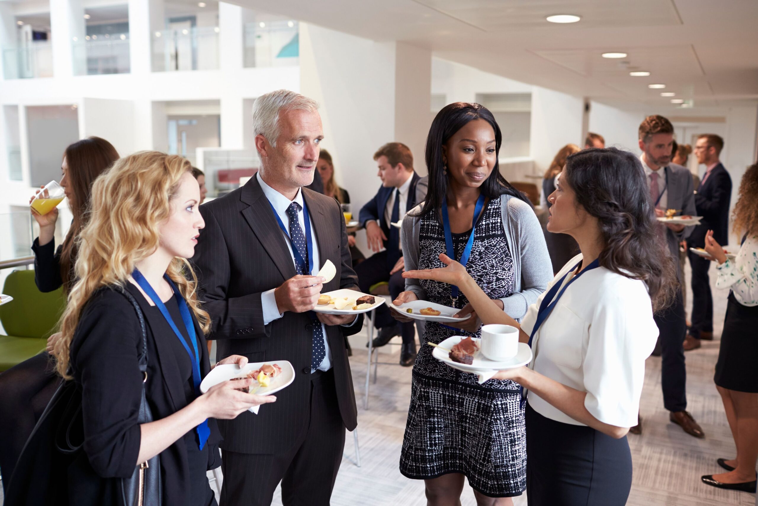 Business workers at networking event